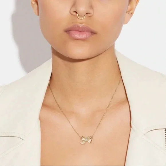 COACH Pavé Bow Pendant Necklace - Picture 3 of 8